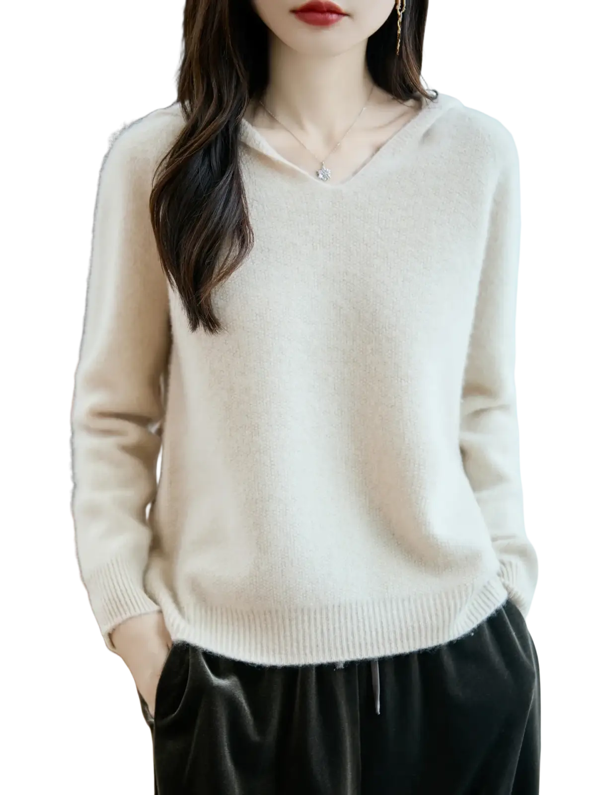 Cream-colored pure wool v-neck pullover sweater with soft knit fabric and ribbed cuffs and hem