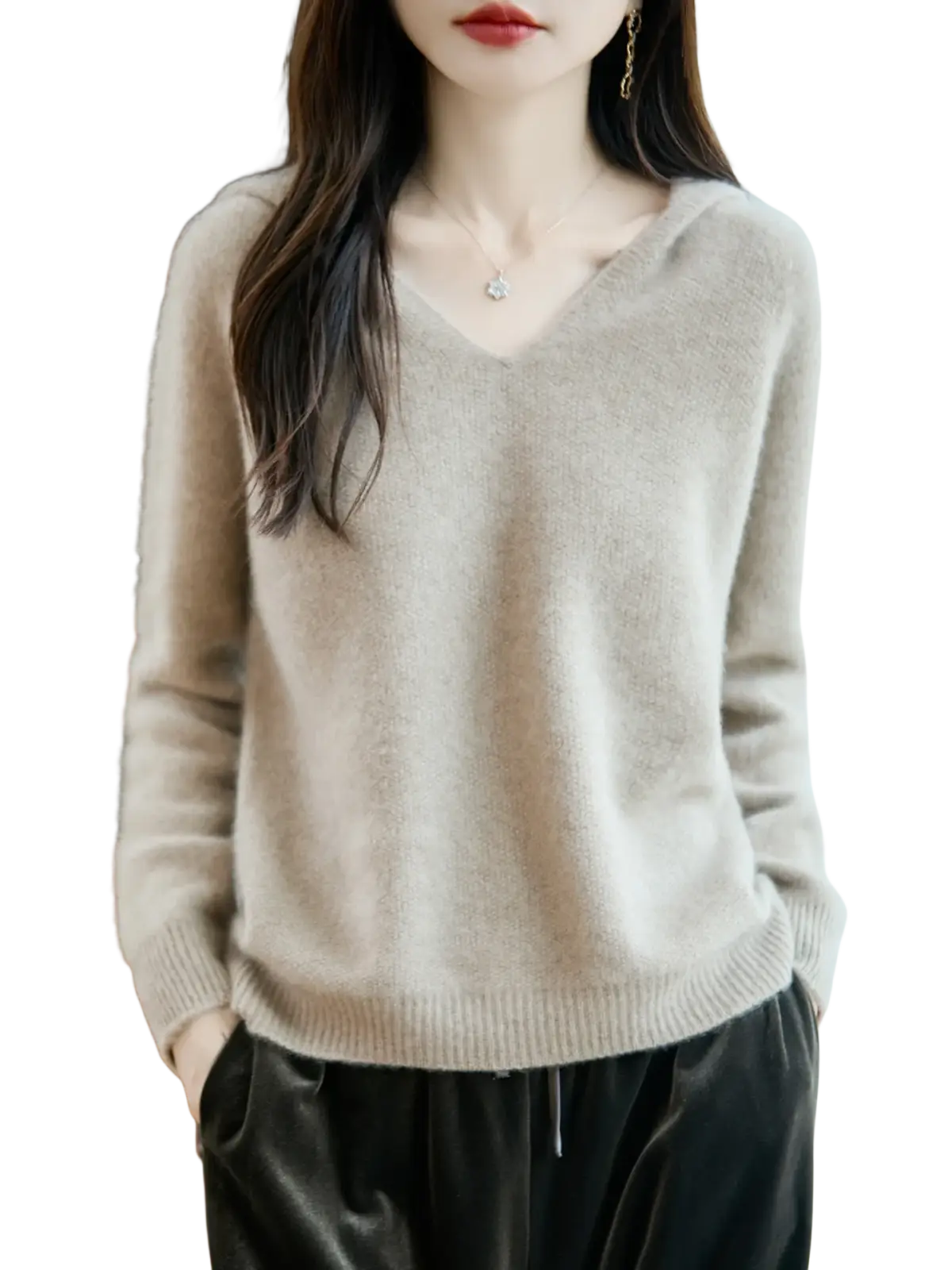 A soft light beige pure wool hooded pullover sweater with cozy knit texture and ribbed cuffs