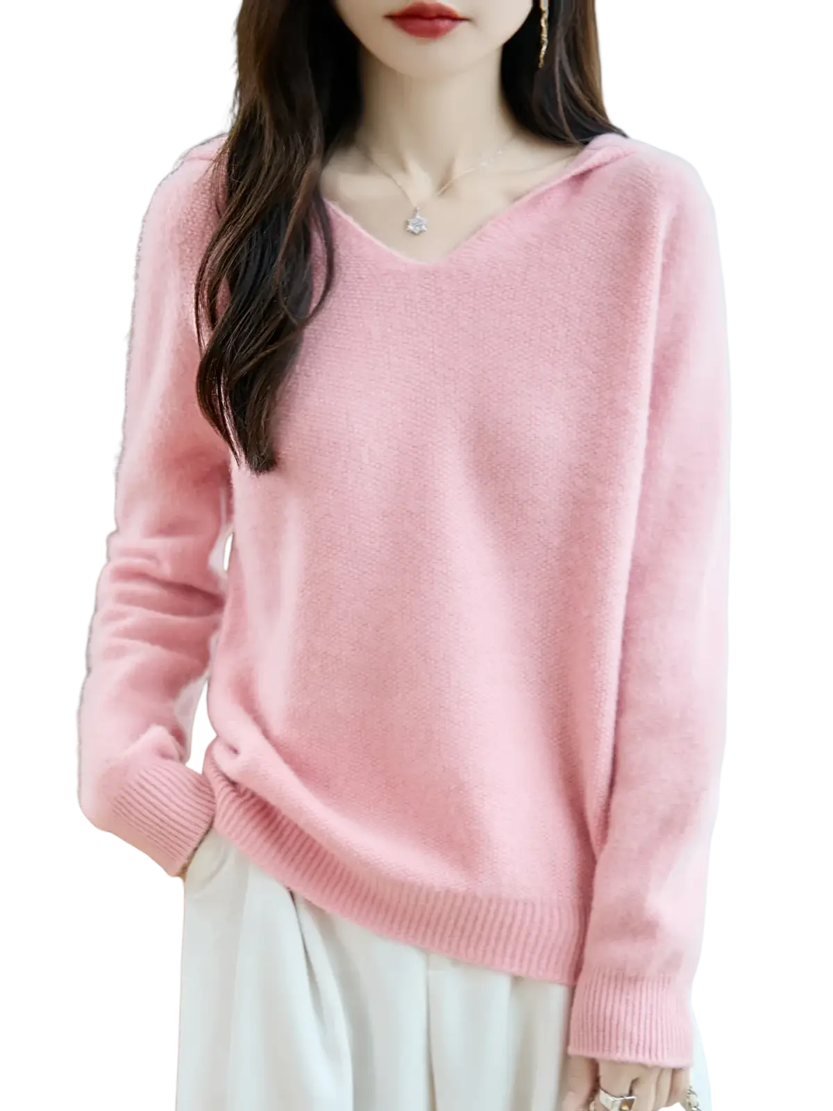 A soft pink pure wool hooded pullover sweater with a cozy knit texture and ribbed cuffs long-sleeved v-neck design