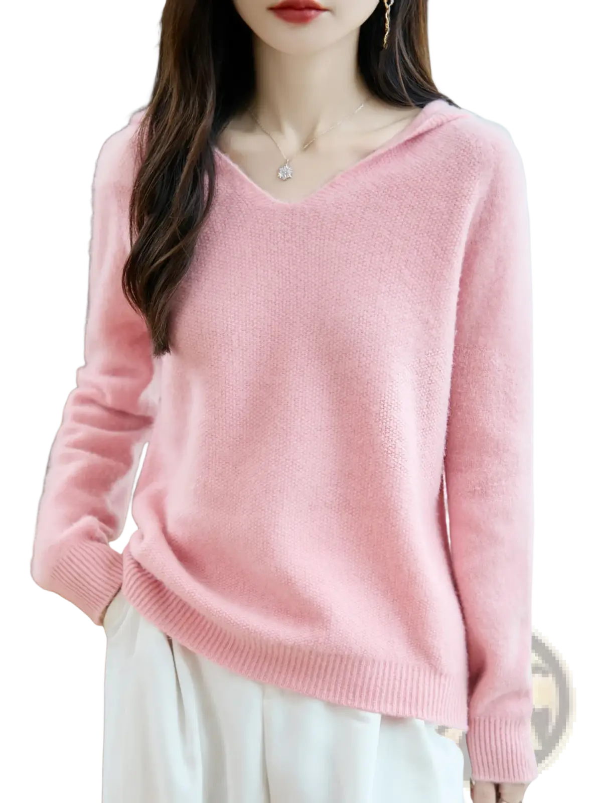 A soft pink pure wool hooded pullover sweater with a cozy knit texture and ribbed cuffs in long sleeves