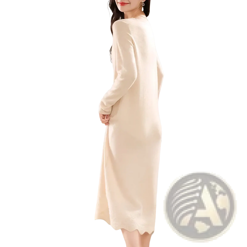 A cream-colored pure wool knit midi dress with long sleeves and a scalloped hemline