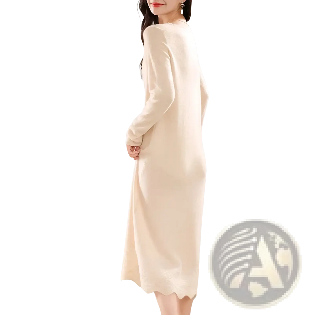A cream-colored pure wool knit midi dress with long sleeves and a scalloped hemline