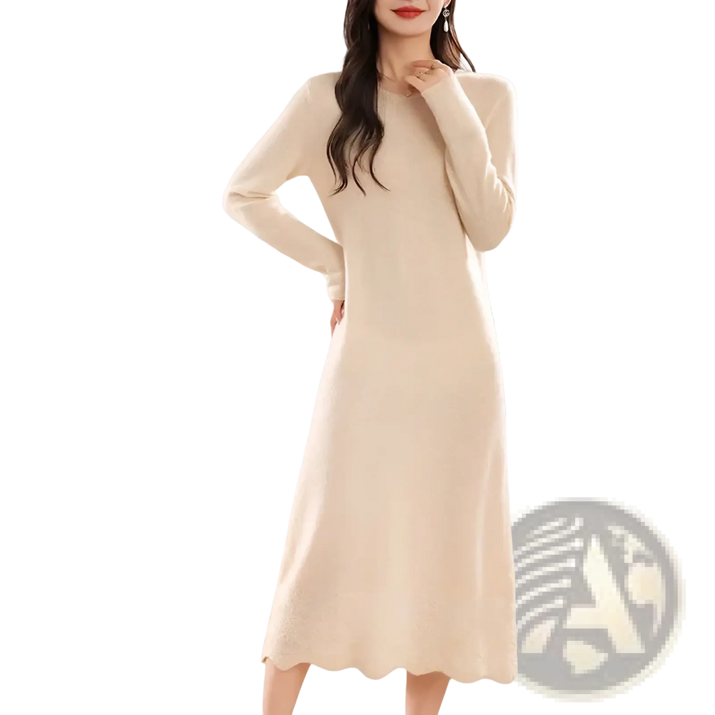 A soft cream-colored pure wool knit midi dress with long sleeves round neckline and scalloped hem