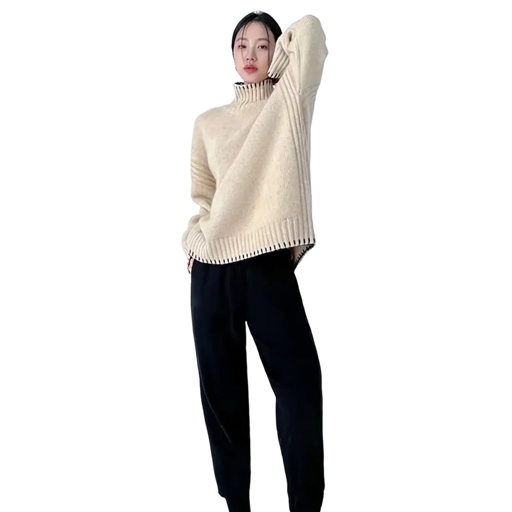 Cream-colored pure wool turtleneck sweater for women with ribbed knit and relaxed fit front view