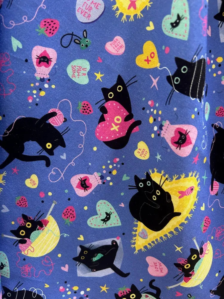 Purple cat retro doris pleated cotton skirt with pockets in blue fabric featuring whimsical black cats and valentine hearts pattern