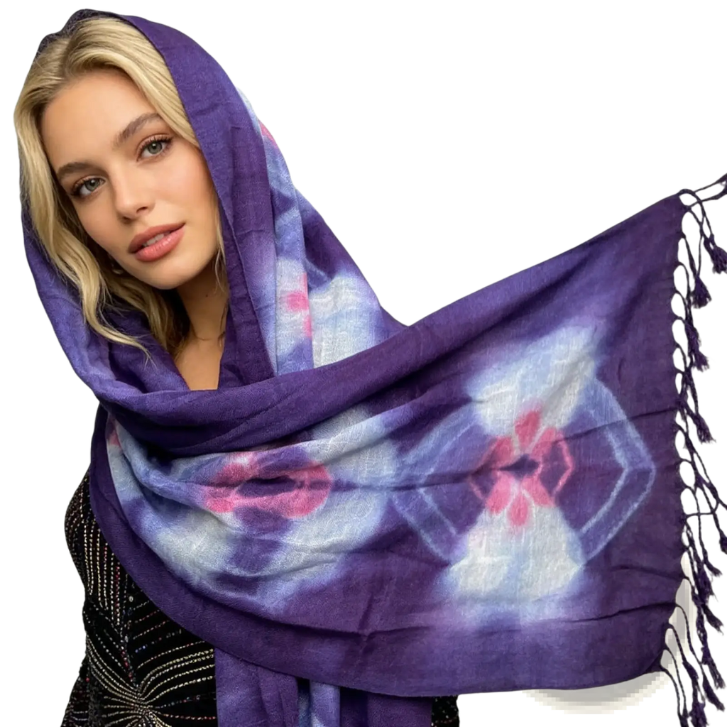 A soft flowing purple tie-dye viscose scarf with pink white floral patterns and dark tassels titled purple floral boho viscose scarf