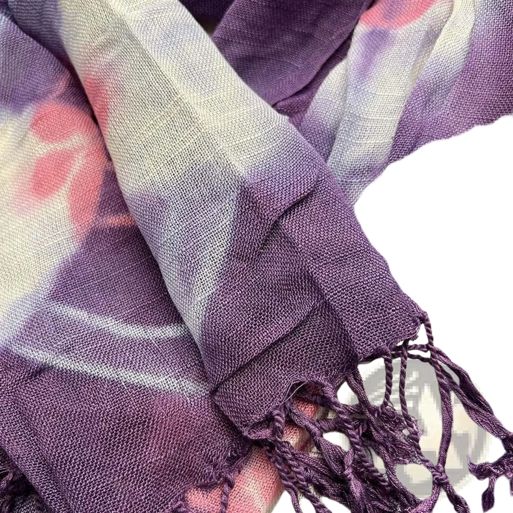 Purple floral boho viscose scarf with soft tie-dyed purple and pink shades, textured weave, and fringed edges