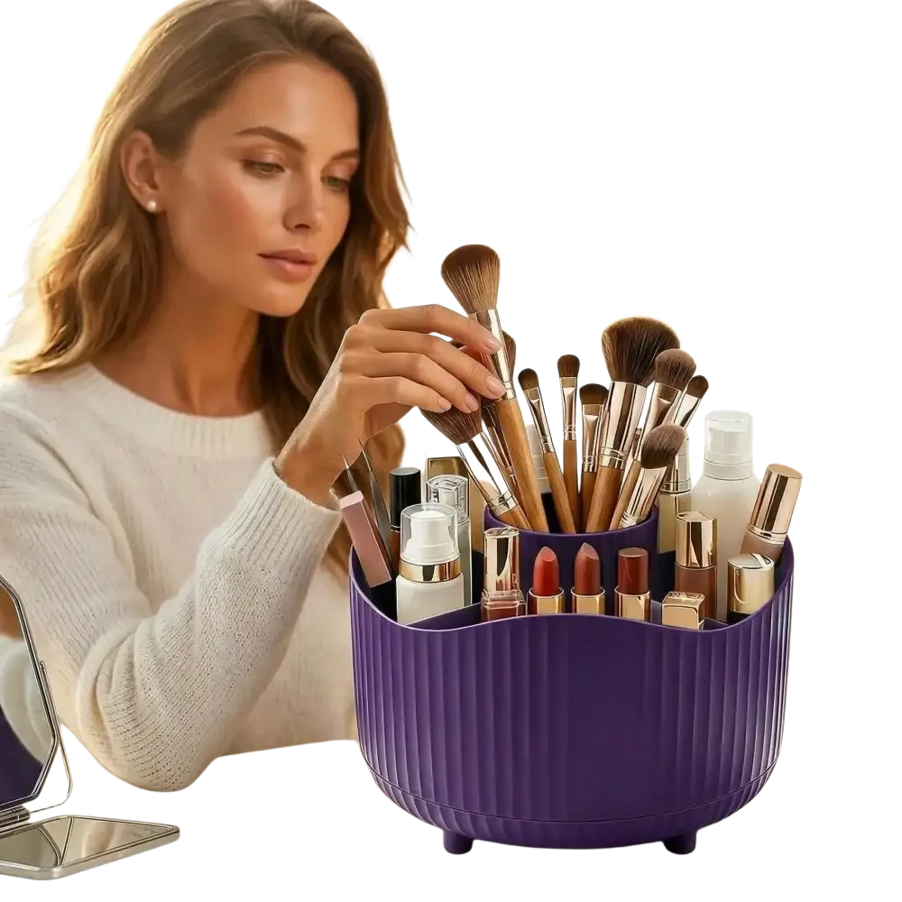 Purple rotating ribbed plastic makeup organizer with multiple compartments holding brushes lipsticks and skincare bottles
