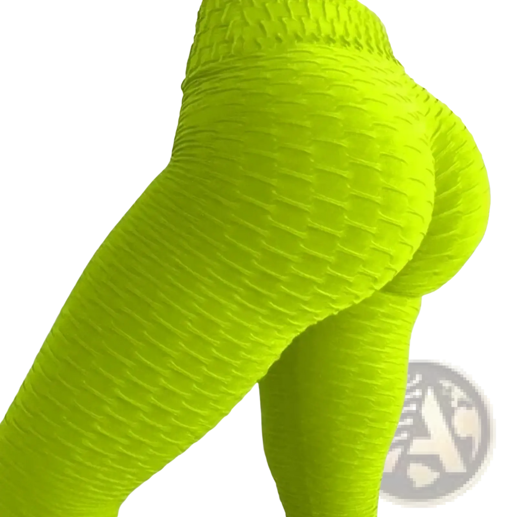 Bright neon green high waisted seamless push up butt lifting leggings with a textured ribbed pattern for workouts