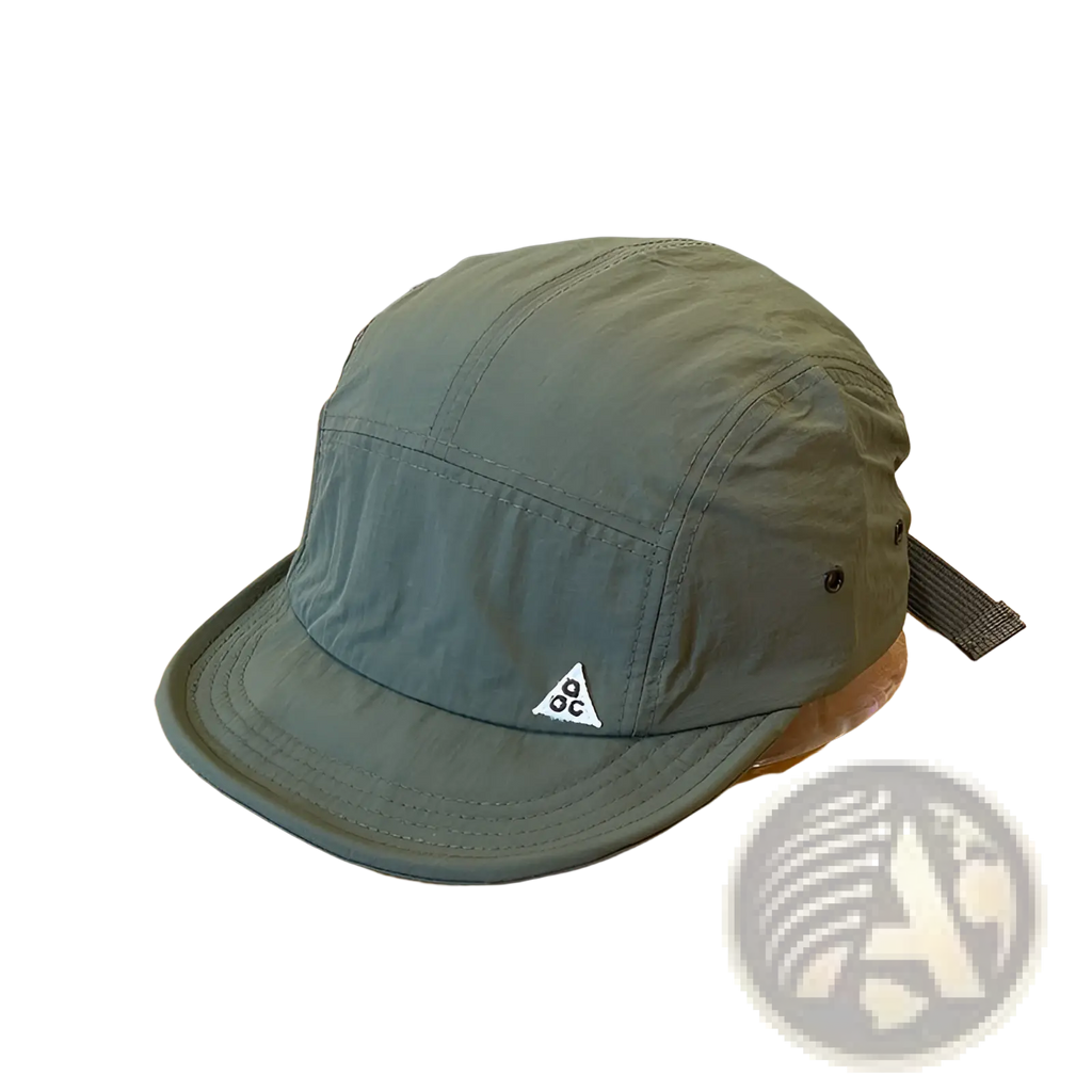 Olive green quick drying five panel cap with short brim and white triangular logo on the front