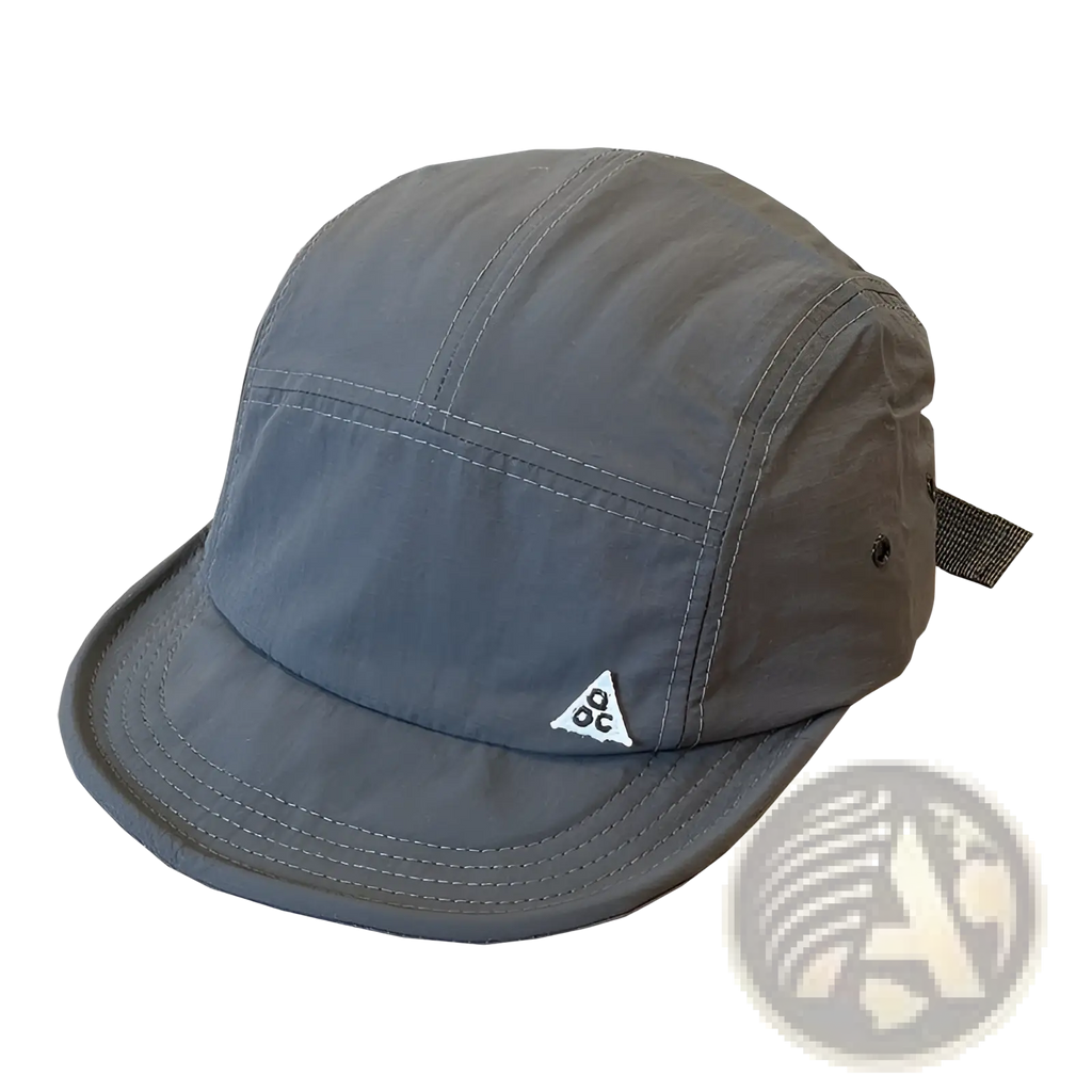 Gray quick drying five panel cap with white embroidered Nike Air logo and short brim for outdoor use