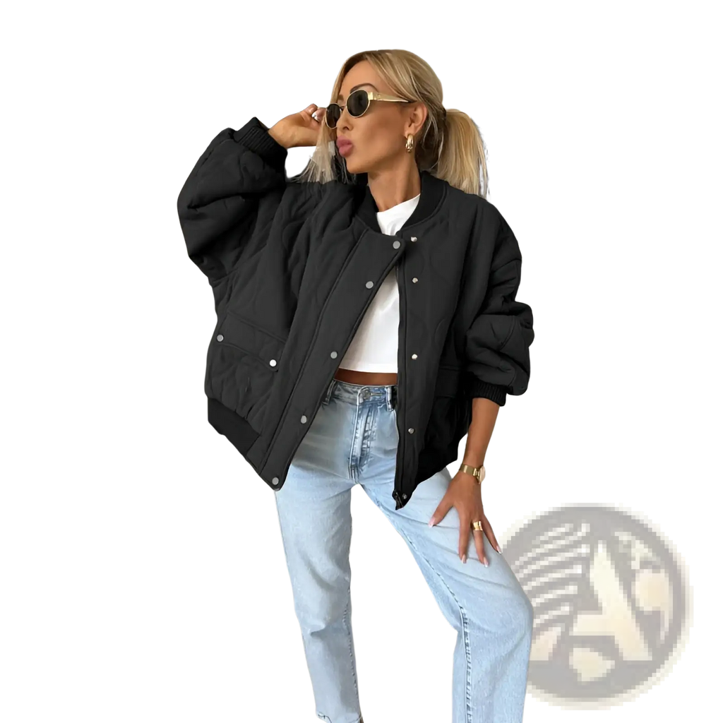 Black quilted bomber jacket with silver buttons and ribbed cuffs designed for casual outerwear use