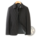 Black quilted business jacket with lightweight diamond lattice pattern and mesh-lined collar for professional wear
