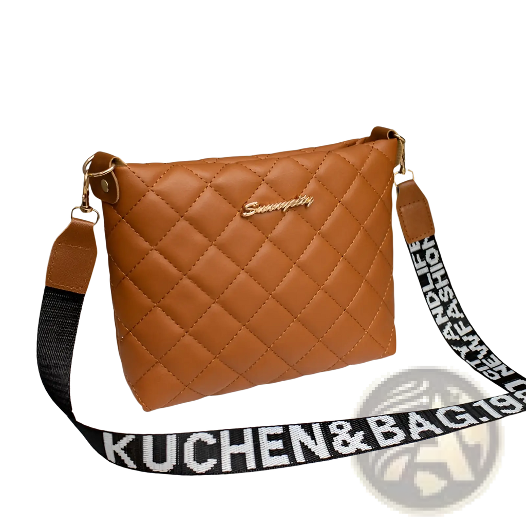 Tan quilted chain messenger bag with black and white striped crossbody strap featuring kuchen&bag19 text