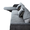 Gray quilted corduroy non slip sofa cover protector with a textured diamond stitched pattern