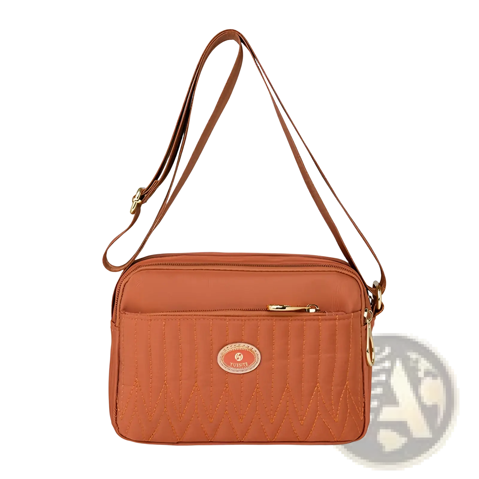 Tan quilted crossbody bag with gold-tone hardware and circular logo patch, featuring an adjustable gold strap