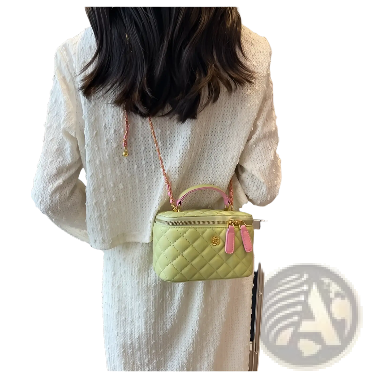 Pastel green quilted diamond crossbody bag with pink pu leather handles and gold-tone chain strap hardware