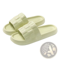 Pair of pale green rubber quilted EVA soft sole breathable slide sandals with textured woven-patterned straps
