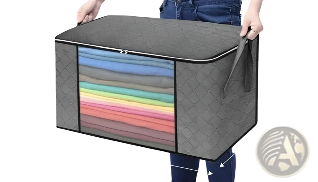 Gray quilted fabric clothes storage bag with zipper closure and handle designed for neatly folded laundry