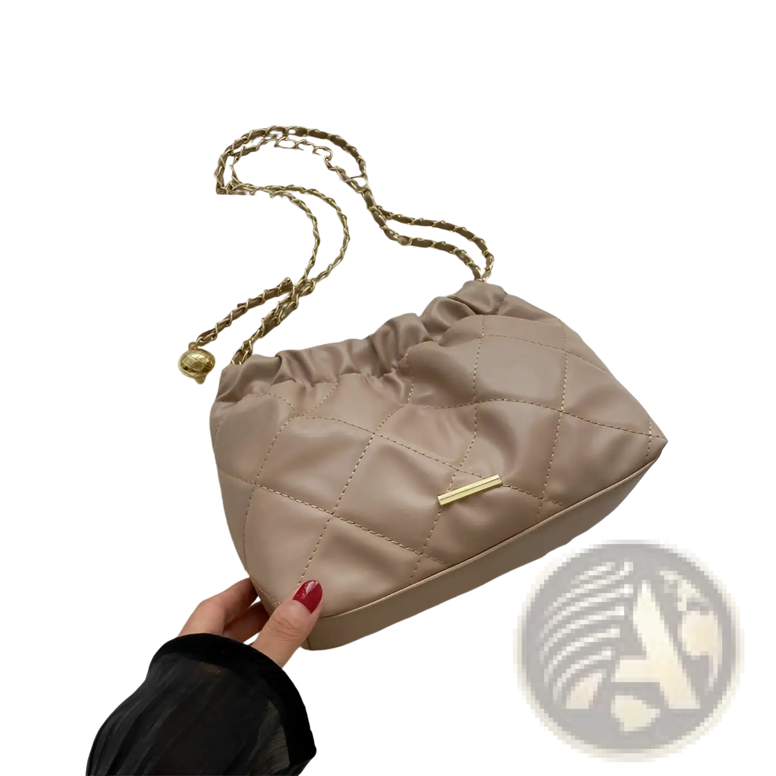 Beige quilted faux leather crossbody bag with gold-tone chain strap and small metallic clasp for stylish use