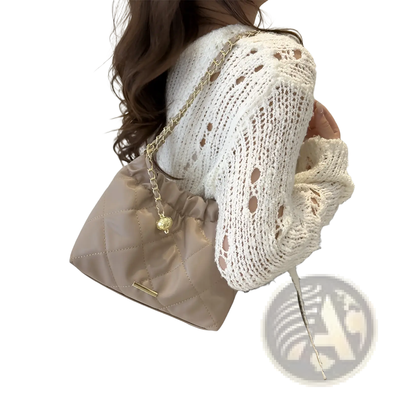 Beige quilted faux leather crossbody bag with gold-tone chain strap and small golden charm for elegant use