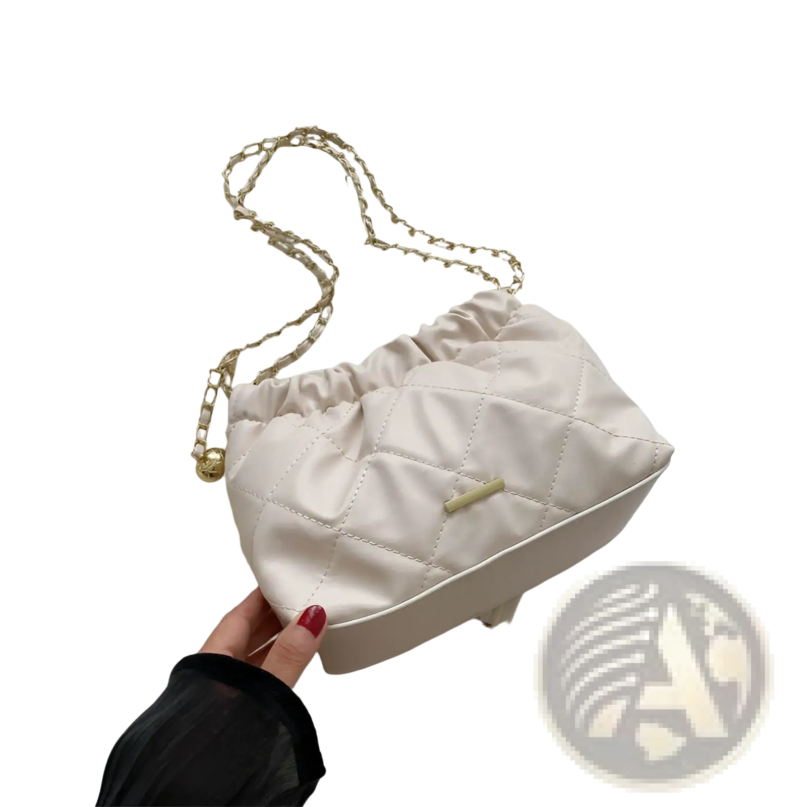 Beige quilted faux leather crossbody bag with satin finish gold-tone chain strap and small metallic clasp
