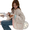 A cozy cream-colored quilted floral cotton winter jacket with pink trim and checkered cuffs for cold weather