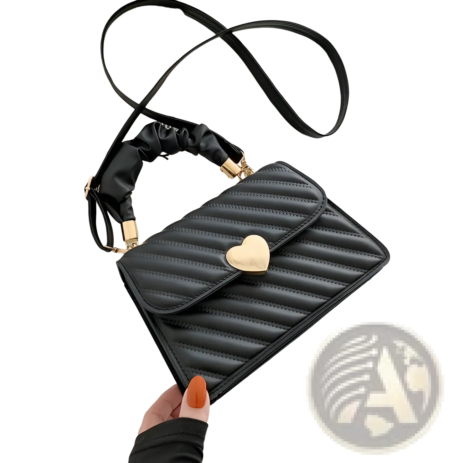 Black quilted crossbody bag with a gold heart clasp and ruched black handle for stylish everyday use