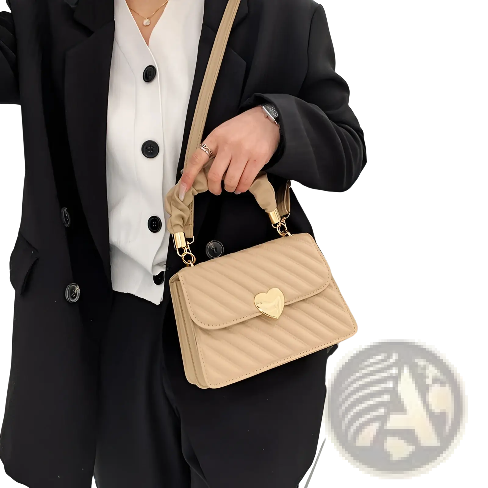 Beige quilted crossbody bag with gold heart-shaped clasp and matching adjustable strap from the quilted heart clasp collection