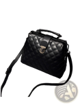 Black quilted leather retro doctor shoulder bag with silver-toned clasp and top handle for elegant use