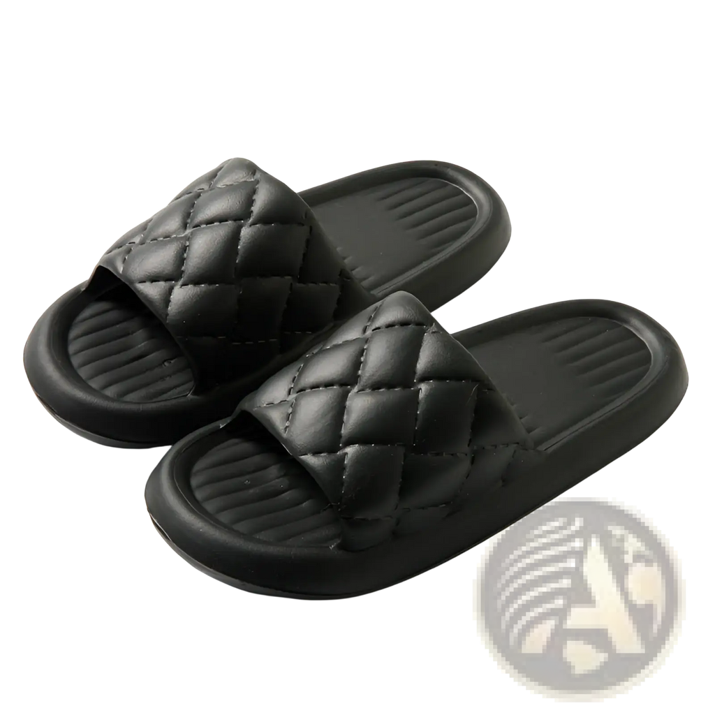 Black quilted non slip lightweight slide sandals with diamond patterned upper and ribbed rubber sole for home use