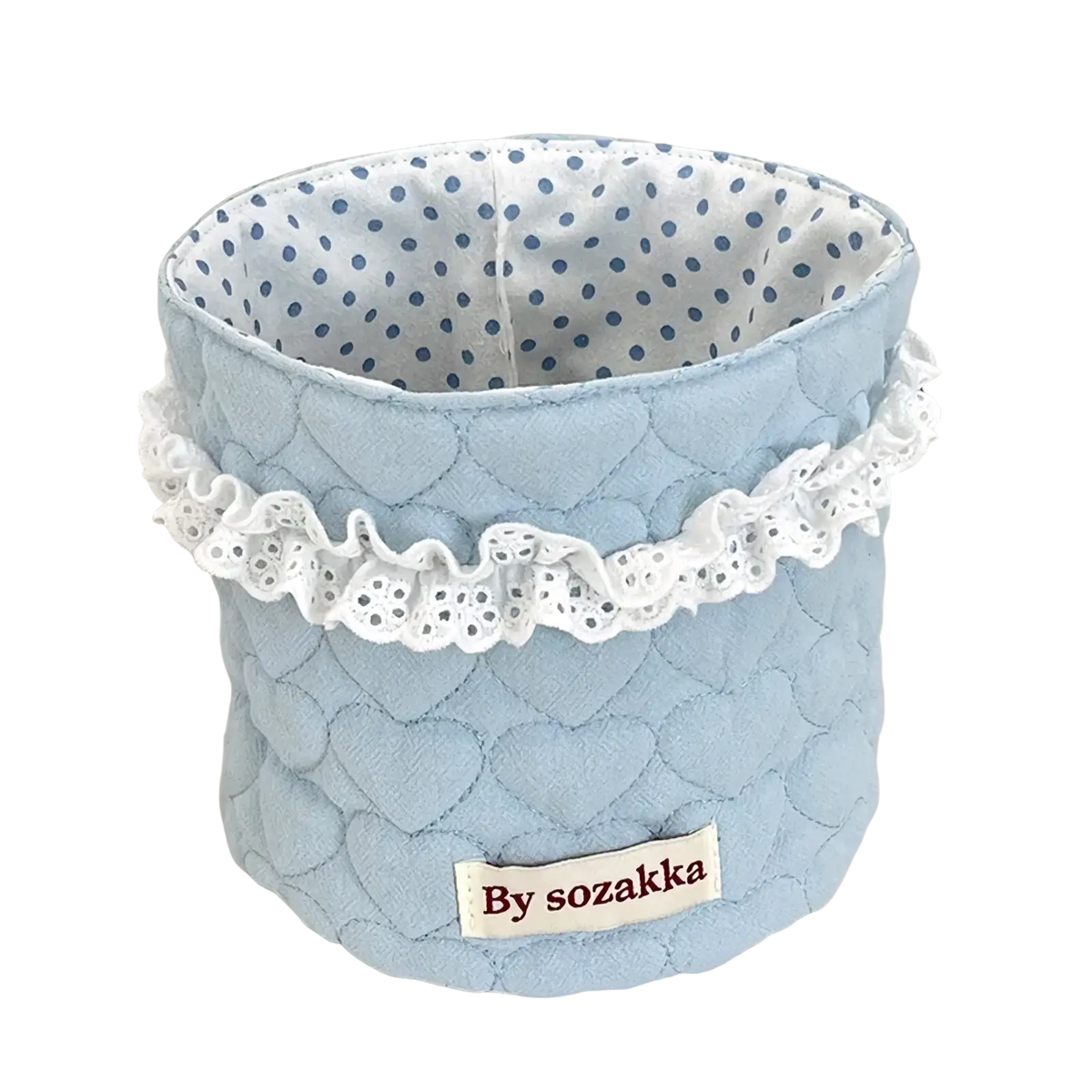 Light blue quilted fabric nursery storage basket with white lace trim and polka-dot interior by sozakka