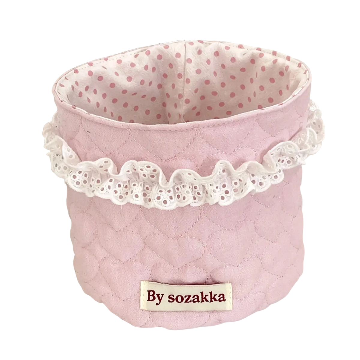 Pink quilted nursery storage basket with white lace trim and polka-dotted interior by sozakka