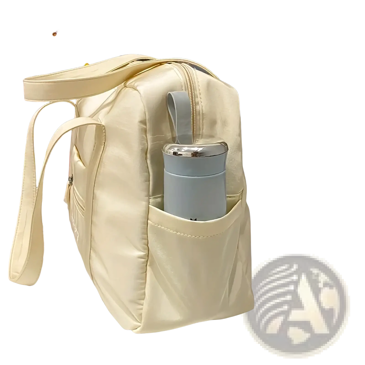 Cream-colored quilted nylon travel tote bag with front pocket holding a light blue insulated travel mug and plush charm