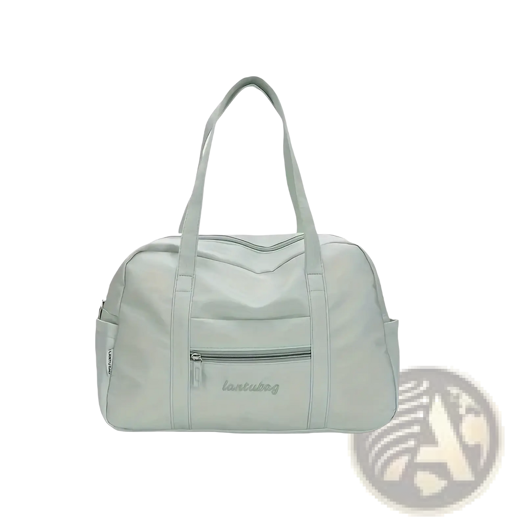 Light gray quilted nylon travel tote bag with plush charm durable with two top handles and front zippered pocket
