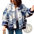 Blue and white patterned quilted bomber jacket for women with striped cuffs and comfortable fit