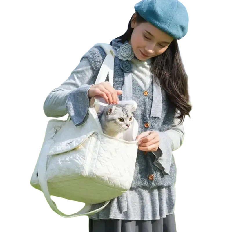 White quilted pet carrier bag with soft padded interior and adjustable shoulder strap for small cats and dogs