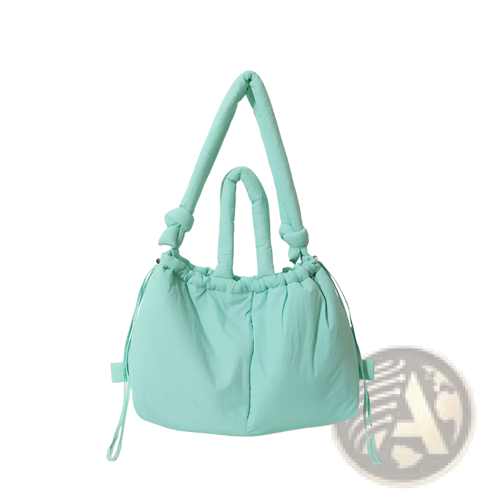 A soft mint green quilted puffer tote bag with padded knotted handles and drawstring ties made of lightweight nylon