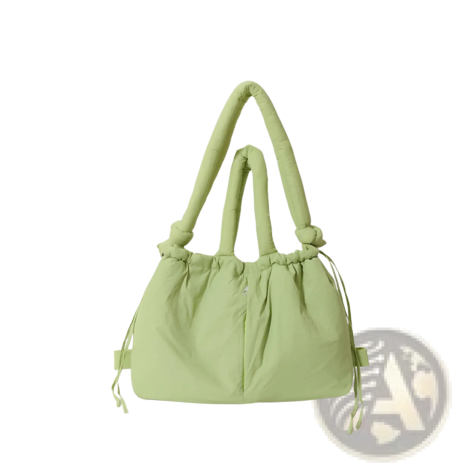 A soft light green quilted puffer tote bag with thick handles and drawstring ties made from lightweight nylon