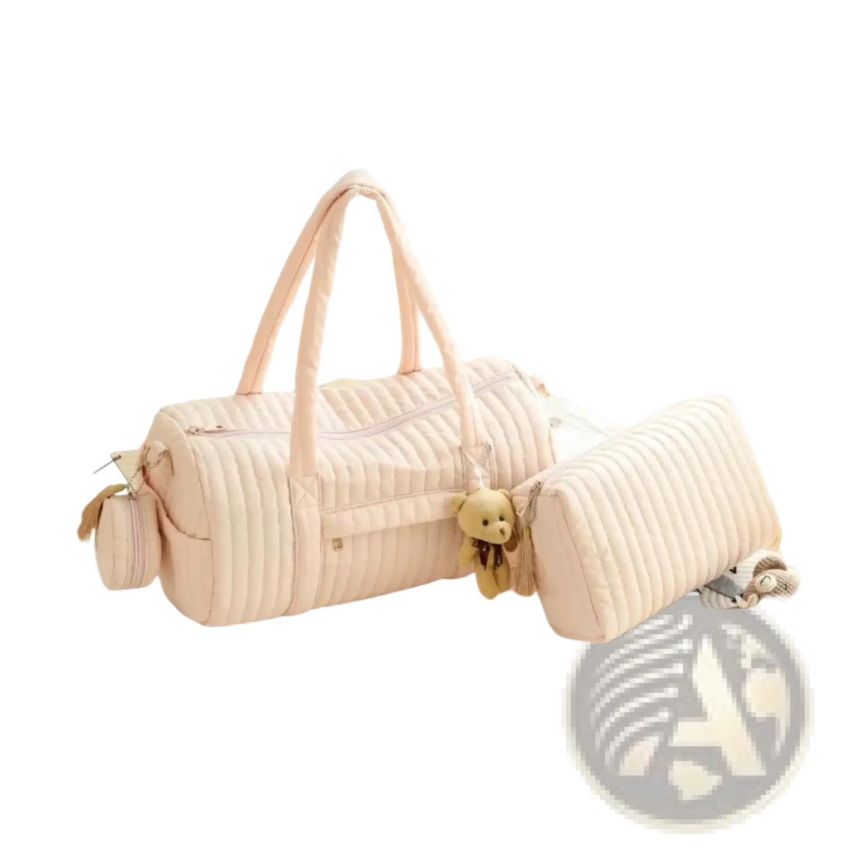 Pink quilted stroller organizer bag with matching handles and a small teddy bear charm accessory