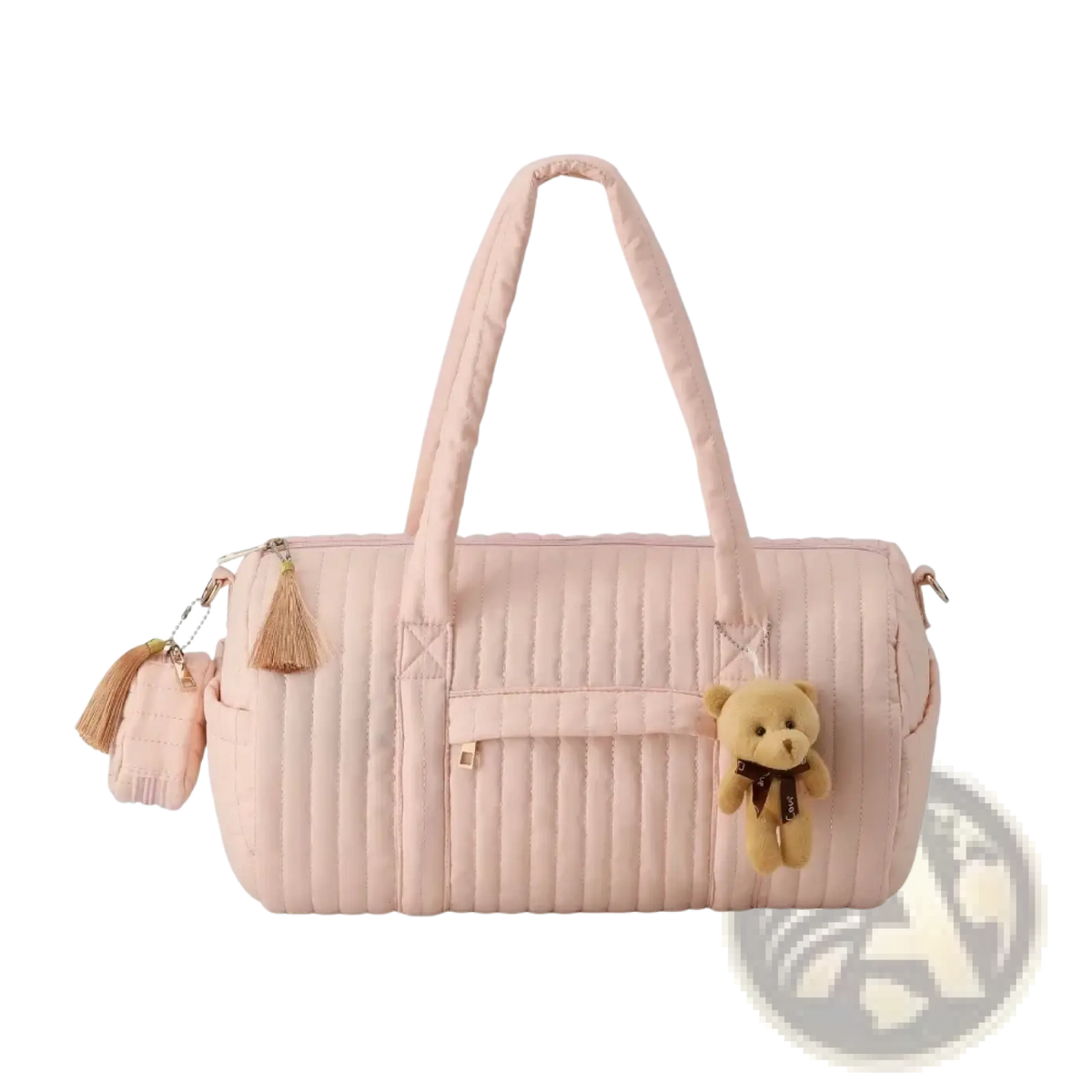 A soft pink quilted stroller organizer bag with matching handles decorative tassels and a small teddy bear charm