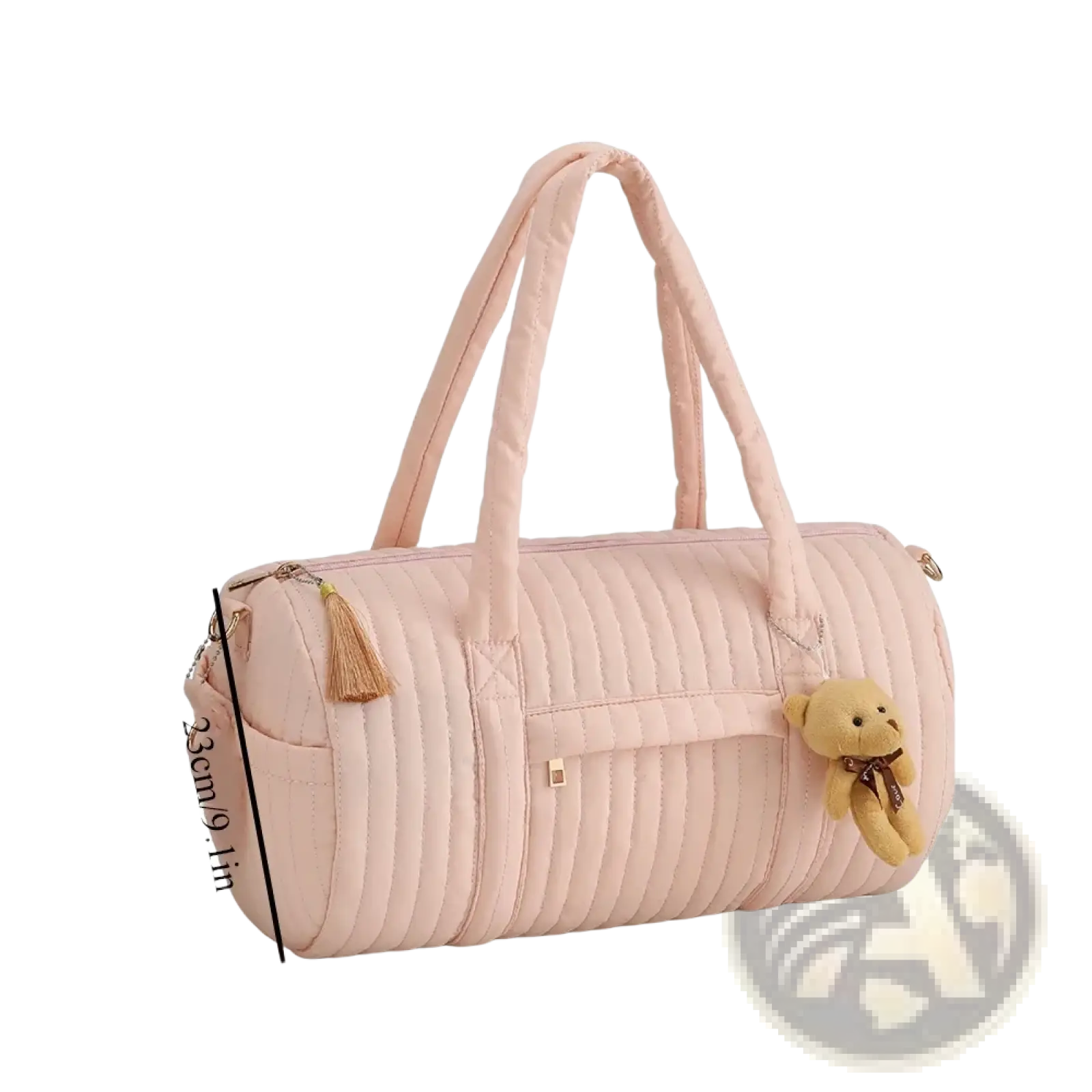 A soft pink quilted stroller organizer bag with plush teddy bear charm and tassel accents in fabric material