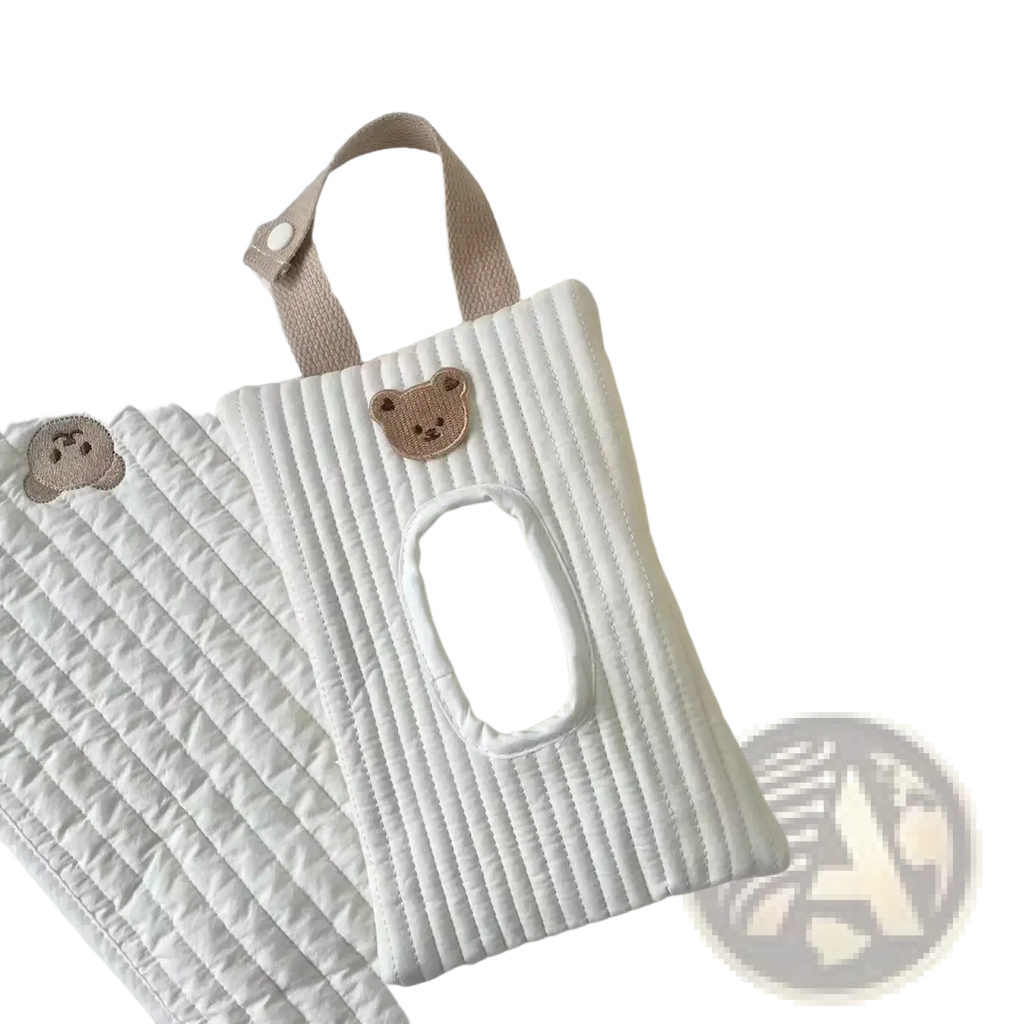 White quilted stroller tissue holder with beige bear appliqué and matching strap for wipes pouch use