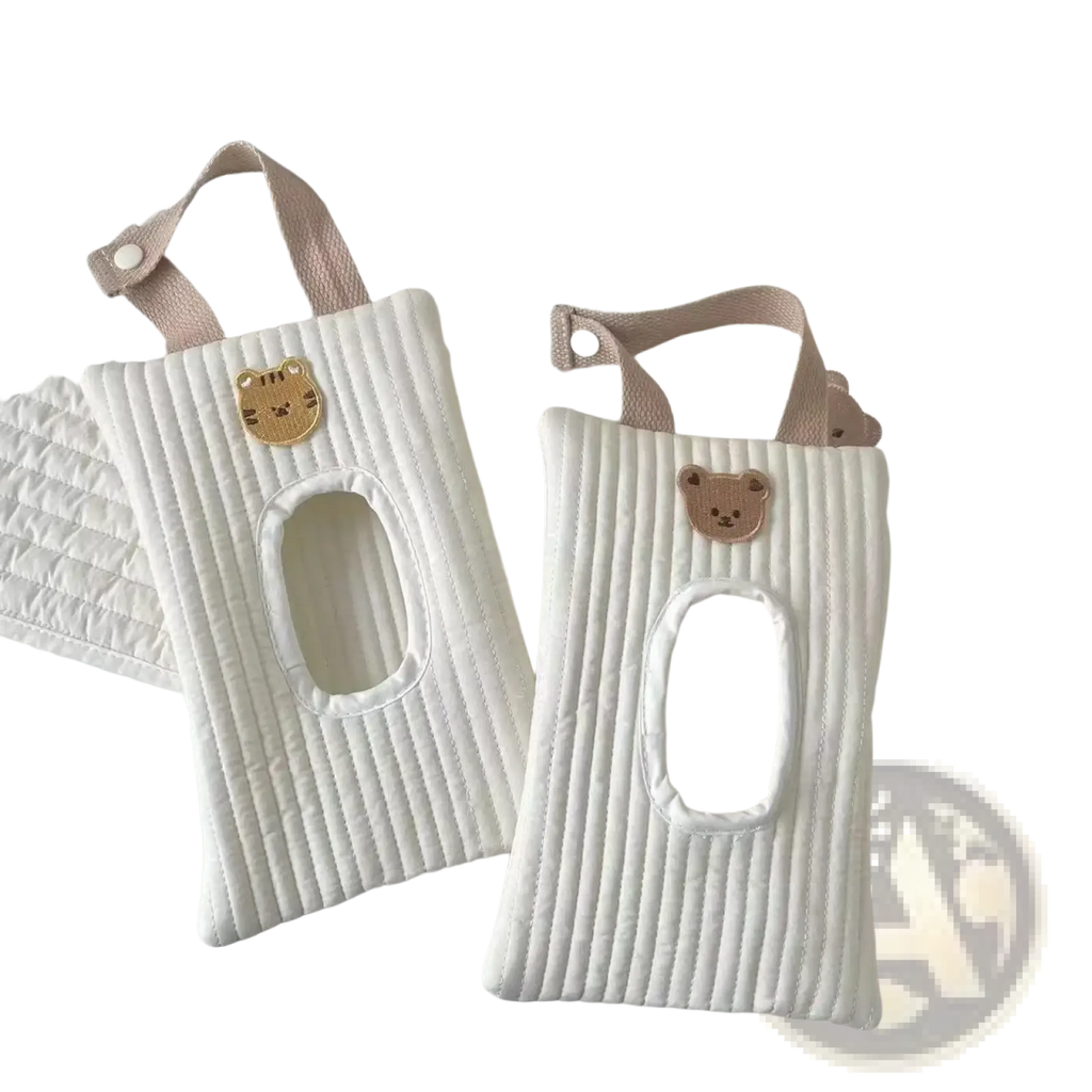 White quilted stroller tissue holder with beige fabric handle and cute embroidered bear face for wipes storage