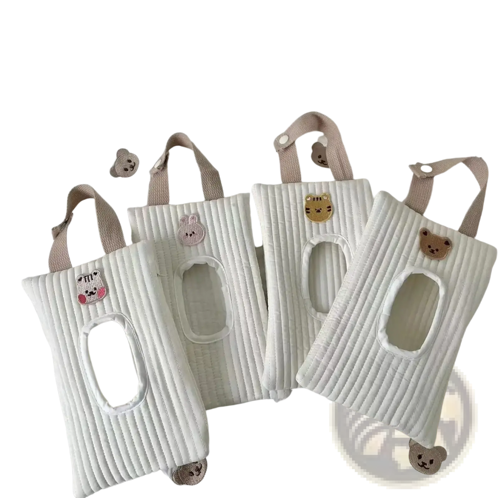 Quilted stroller tissue holder and wet wipes pouch in white with embroidered animal faces and beige fabric handles