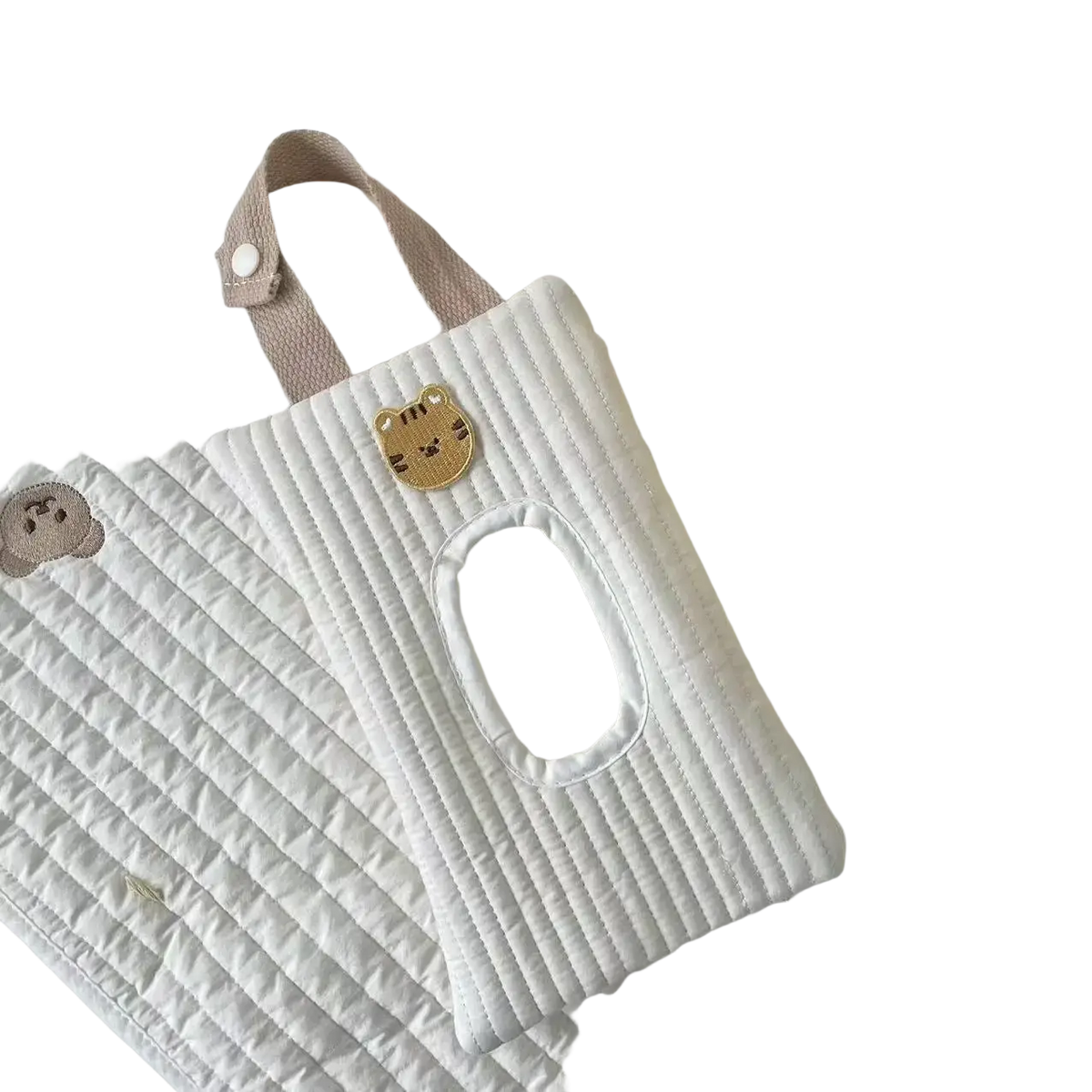 White quilted stroller tissue holder with beige strap and golden tiger face patch for wet wipes storage