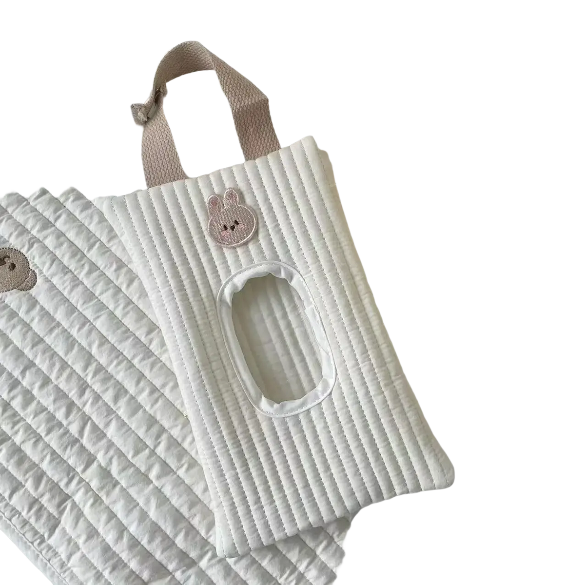 White quilted tissue holder with soft pink bunny appliqué and matching fabric strap for stroller use