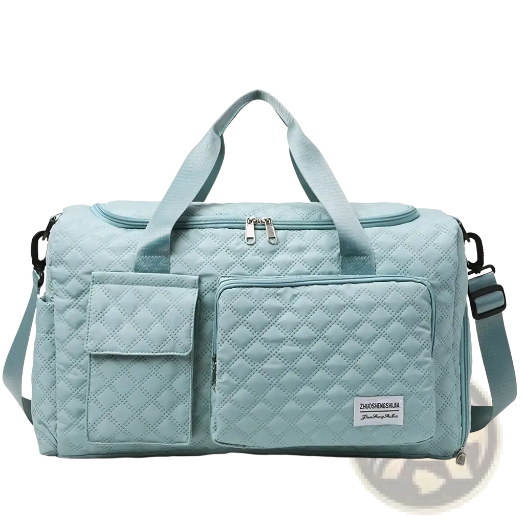 Light blue quilted large waterproof travel duffel bag with two front pockets and adjustable shoulder strap