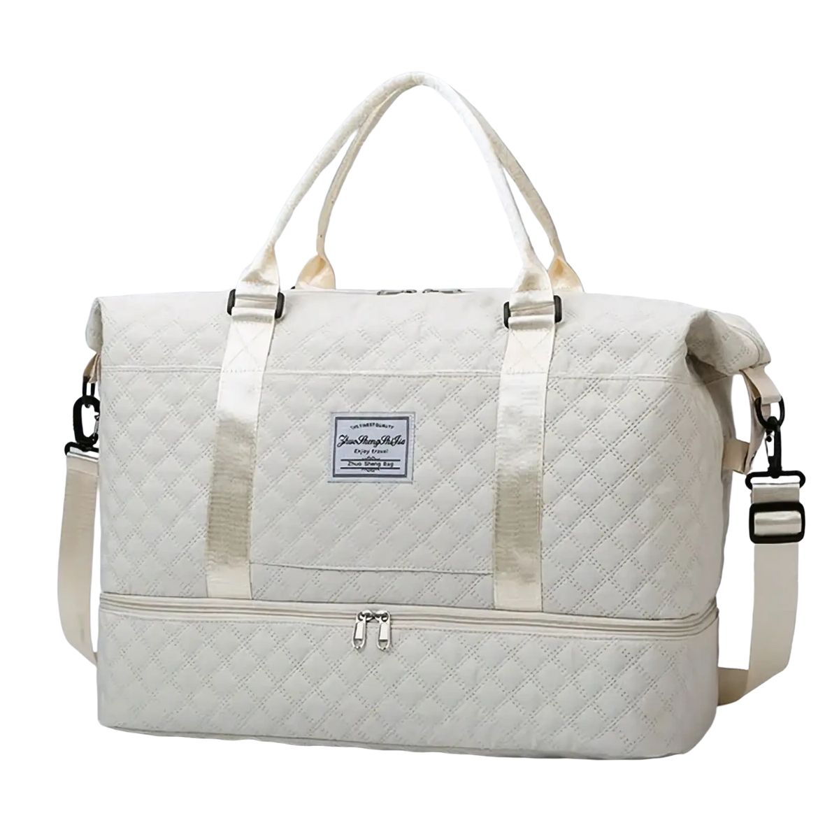 Cream-colored quilted large weekender tote duffel bag with front patch label and adjustable shoulder strap for travel