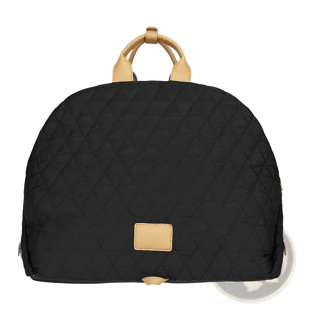 Black quilted travel pet carrier bag with tan leather handles and matching rectangular leather patch